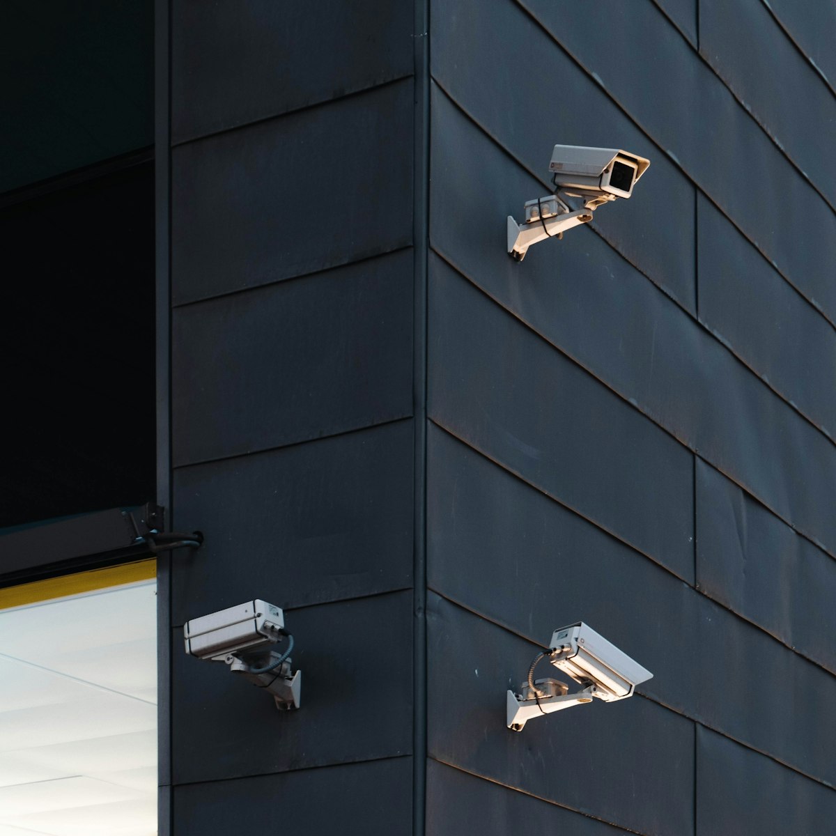 CCTV cameras mounted on a modern building
